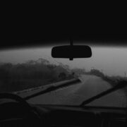 Photo of person driving a car while raining 2422160