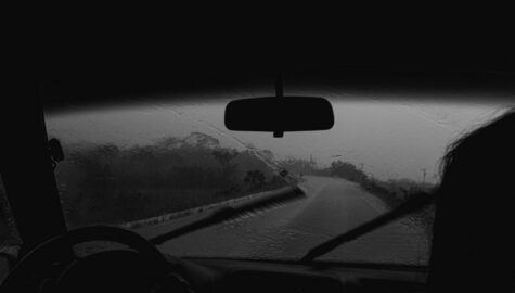 Photo of person driving a car while raining 2422160