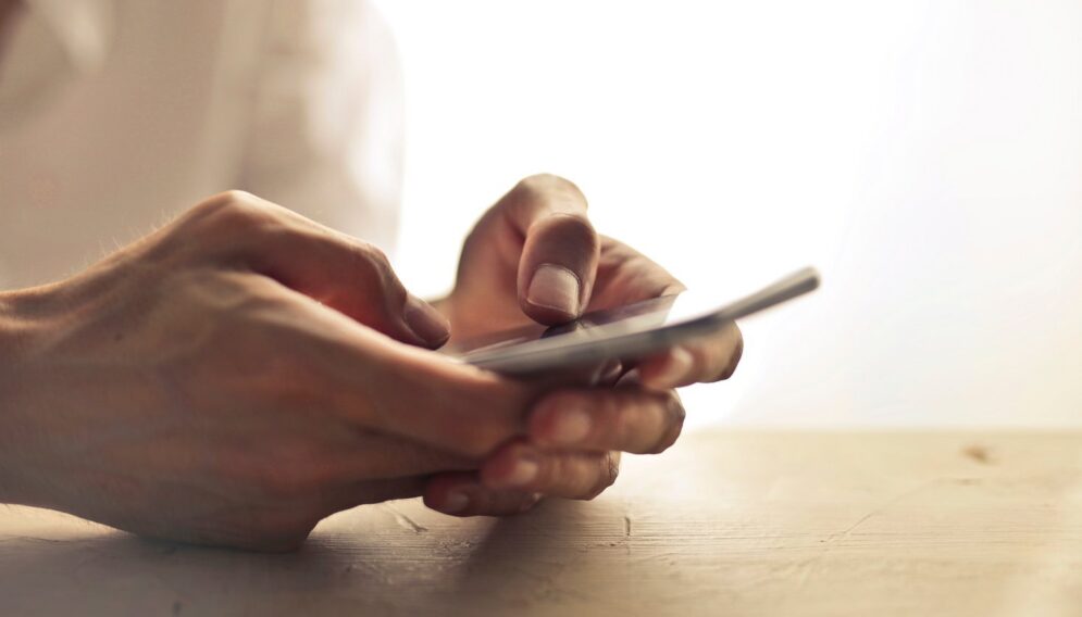 Person using smartphone 1458283