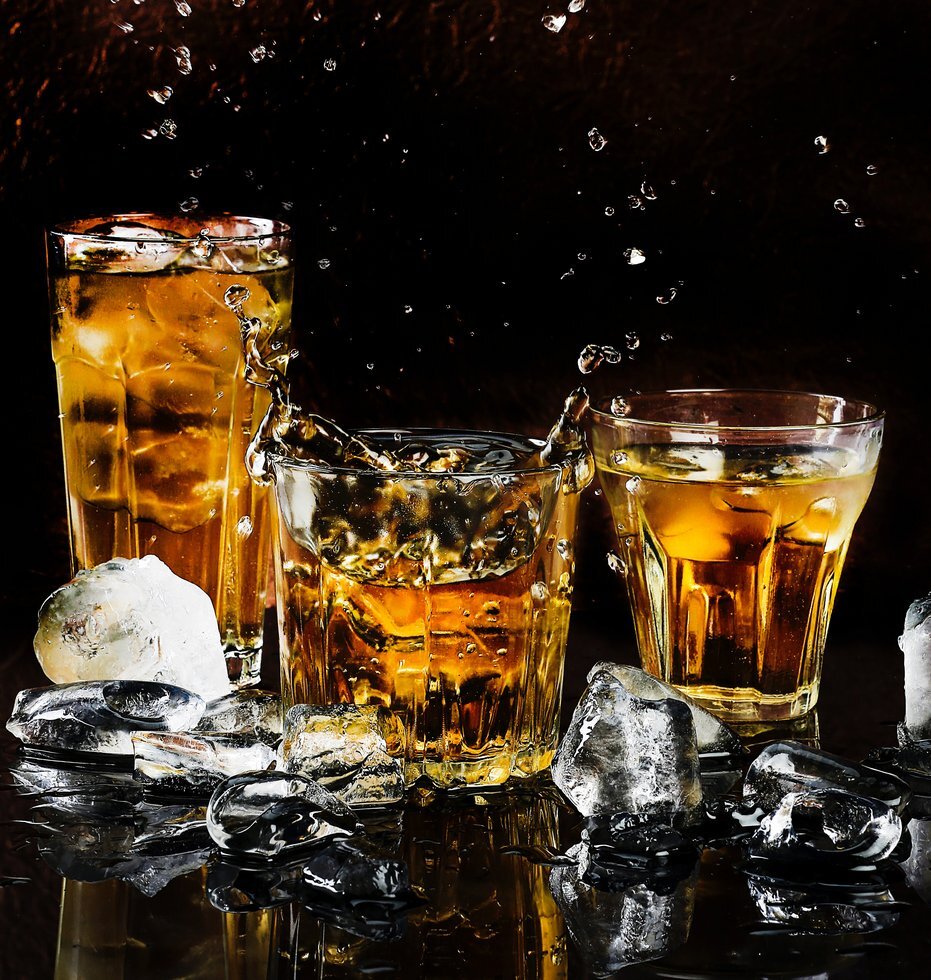 Alcohol bar black background close up 602750