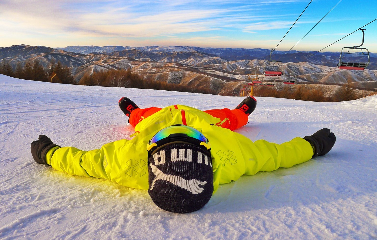 Person lying on snow ground 1705855