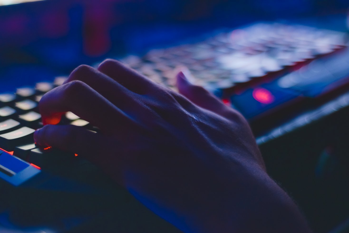 Photo of person typing on computer keyboard 735911